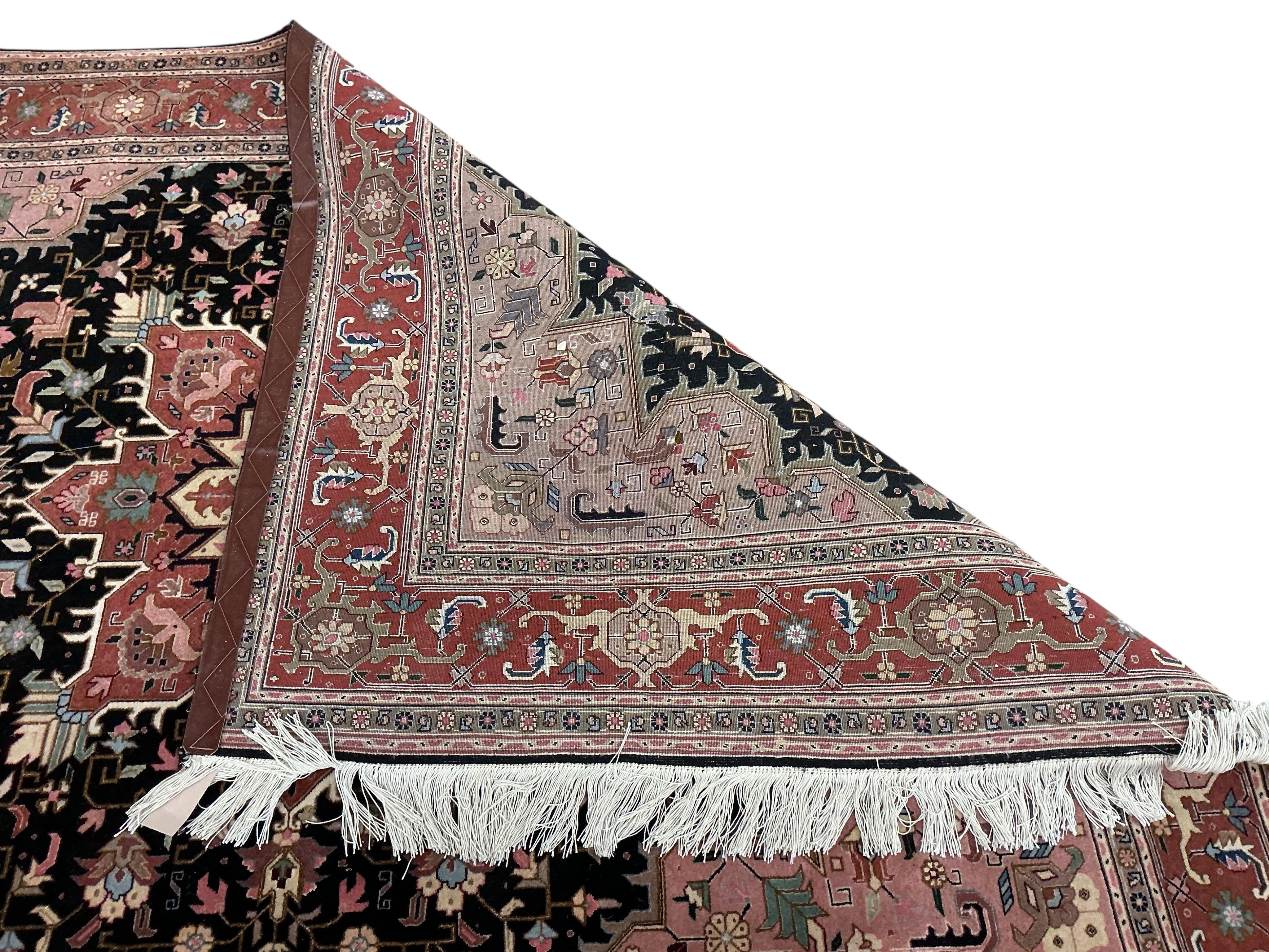 A North West Persian part silk blue ground rug, approx. 190 x 150cm